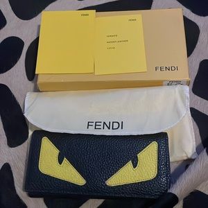 COPY - FENDI MONSTER wallerthe only fault is zipper is off on coin purse